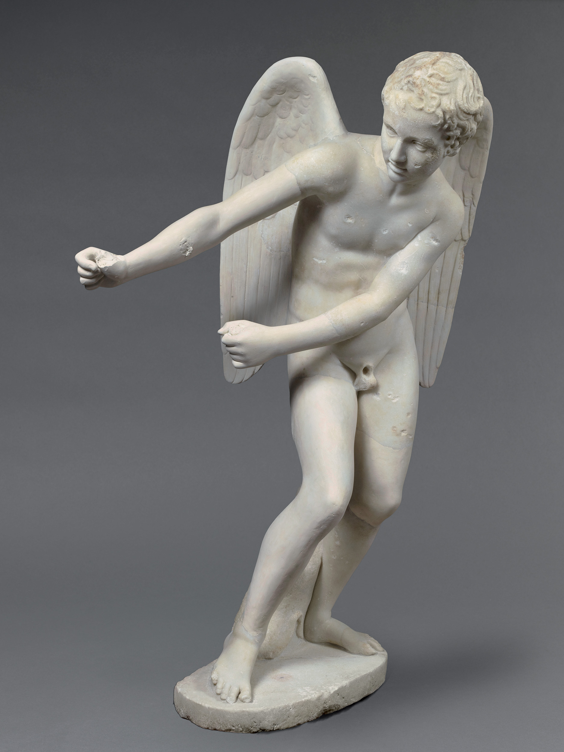 Μαρμάρινο άγαλμα του Έρωτα που τεντώνει το τόξο του  2ος αι. μ.Χ.  Ρώμη, Παλατίνος Λόφος  Παρίσι, Musée du Louvre 
